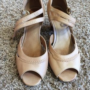 Tan Clark peep toe pumps